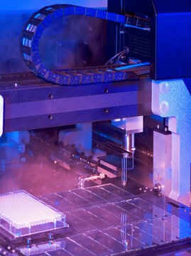 A 3D printer in action, creating a complex geometric object
