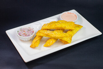 Tequeños o deditos de mariscos