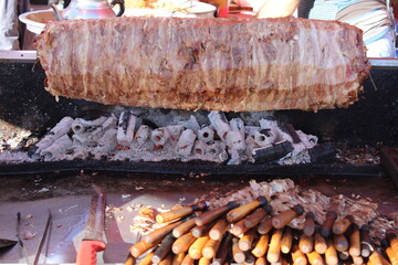 traditional turkish oltu cag crochet shish kebab doner grilled in wood fired oven. Famous yatik...