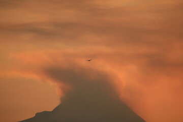 sunset over the clouds