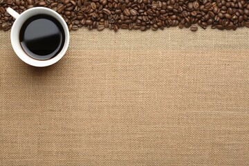 a cup of coffee with coffee beans on the wooden background