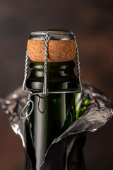 Macro photography of sparkling wine; bottle, cork; champagne; bubble; design; winery; drink; background; celebration; romance; bar, restaurant, conceptual