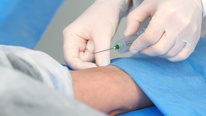 Close-up of blood collection in a clinic or cosmetology center. The concept of health, youth and...