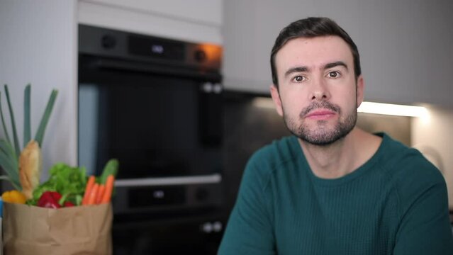 Man at home getting shoking news 