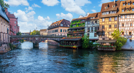 Le Petite France, the most picturesque district of old Strasbourg. Houses with reflection in waters of the Ill channels. - 757258612