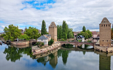 Panoramic view on The Ponts Couverts in Strasbourg with blue cloudy sky. France. - 757258625
