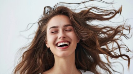 Stylish Woman Smiling Confidently with Wind-Blown Hair