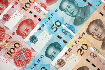 Many money bills of People Republic of China. PRC Yuan banknotes close up