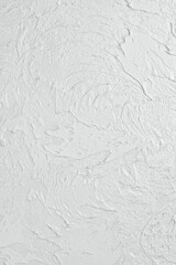 Concrete white background with stone imitation. Top view. Free space for text.