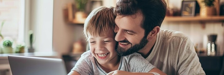 Heartwarming scene of a father and son using a laptop together at home smiling as they work on a fun educational project