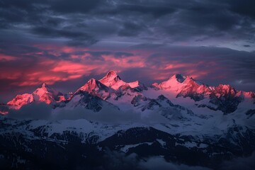 Sunset over Snowcapped Peaks: A Silhouette of Mountains Against a Grey Sky Painted with Red and Pink Hues. - Powered by Adobe