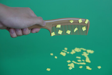 Comb and small pieces of paper. Equipment, prepared to do experiment about static electricity....