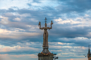 Beautiful close-up view of the famous Imperia statue at the harbour entrance of Constance (Konstanz) by Lake Constance (Bodensee) in Germany on a nice cloudy evening.