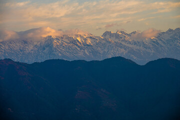 Alpenglow on Snow-Capped Peaks Above Chisopani, Nepal