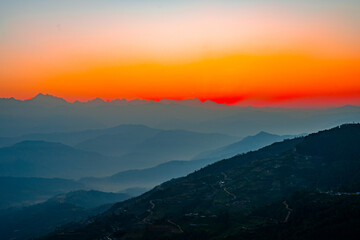 Fototapeta premium Crimson Blaze of Sunset over Nagarkot, Nepal