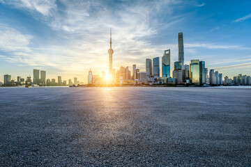 Asphalt road square and city skyline with modern buildings scenery at sunrise in Shanghai