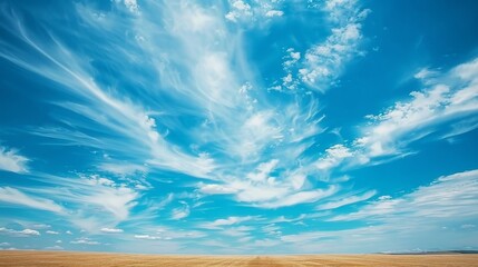 Vast Summer Sky: Serene Cloudscape on a Warm, Carefree Day
