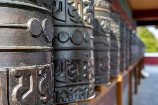 Row of Ancient Tibetan Prayer Wheels at Namobuddha, Nepal