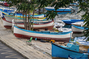 Fototapeta na wymiar Boats in port of historic part of Nesebar city, Bulgaria