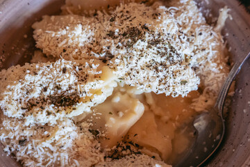 Dumplings sprinkled with cheese, a dish in Cyprus