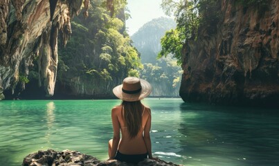 Female traveler admiring the breathtaking scenery of Phang Nga Bay, a popular tourist destination in Phuket