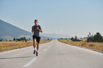 Fototapeta premium A dedicated marathon runner pushes himself to the limit in training.