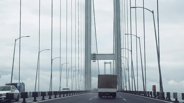 Kocaeli, Dilovasi Turkiye - May 18 2023: Osmangazi Bridge is the fourth longest span suspension bridge in the world built between Dilovası Dil Cape and Altınova Hersek Cape in the Gulf of Izmit
