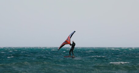 Amazing wingfoil jumping 4k video - Powered by Adobe