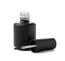 Black bottle of nail polish isolated on white background
