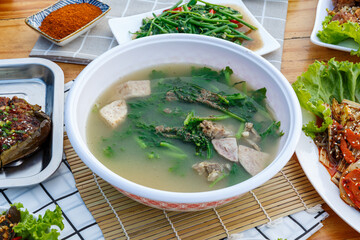Food Boiled taro with choy soup in a bowl