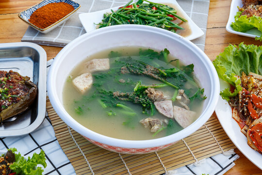 Food Boiled taro with choy soup in a bowl