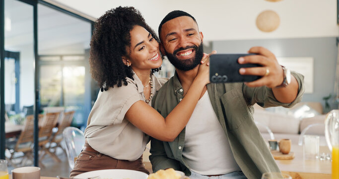Home, selfie and couple with love, funny and smile with happiness and social media in a living room. Apartment, man and woman in a lounge, profile picture and humor with laughing and bonding together