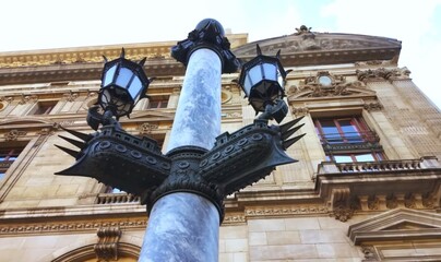 Old lamppost in the historical center of Paris.