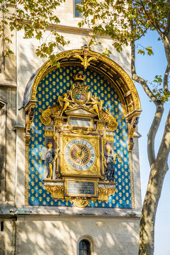 Golden clock of the Tour de l'Horloge, a clock tower in Paris, France