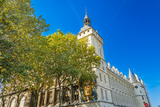 Tour de l'Horloge tower and old time clock of the Conciergerie in Paris, France