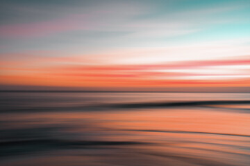 Red sunset over the sea, abstract, soft blur