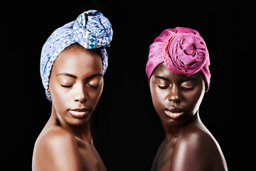Black women, head wrap and relax portrait with beauty, skincare and natural cosmetics in studio....