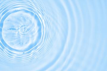 Naklejka na ściany i meble Abstract transparent water shadow surface texture natural ripple on blue background