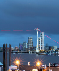 London's cable car with light trails and starburst lights