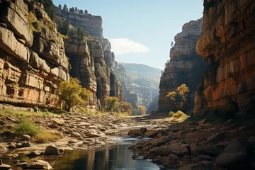 Fotobehang A river flows between mountains in a scenic canyon, carving through bedrock © JackDong