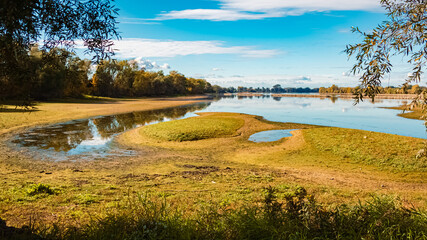Autumn or indian summer view with reflections near Mettenufer, Deggendorf, Bavaria, Germany