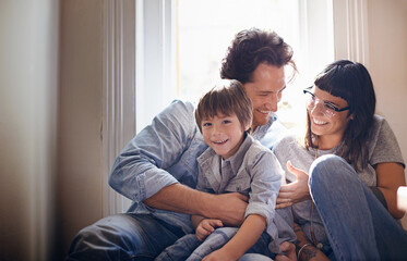 Portrait, laughing or family with child in home, house or apartment for support, care or love....