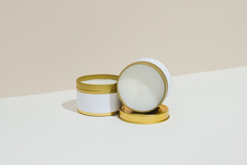 two small gold candles