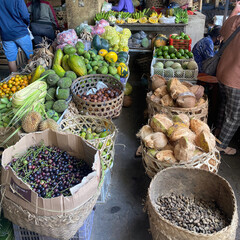 Market stall with vegetables, fruits and meat in Bali