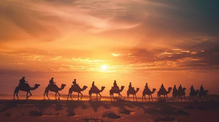 Selbstklebende Fototapeten Silhouettes, people, riding camels in the desert, indigenous people, Tuareg, Arabic, African, Sahara, wildlife, tourist attractions, Dubai, Arabian tour, sunset © Ulee
