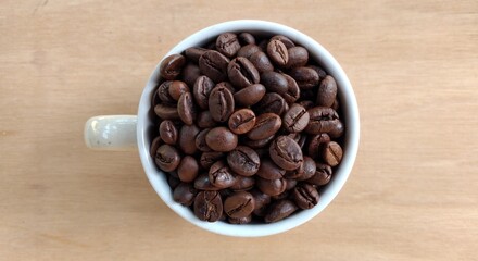 Coffee beans background. Close up of roasted coffee beans.