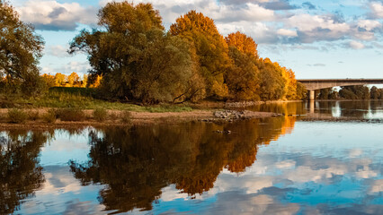 Autumn or indian summer view with reflections at Mount Bogenberg, Bogen, Danube, Bavaria, Germany