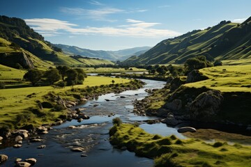 Fototapeta na wymiar Watercourse winding through lush valley, embraced by skyhigh mountains