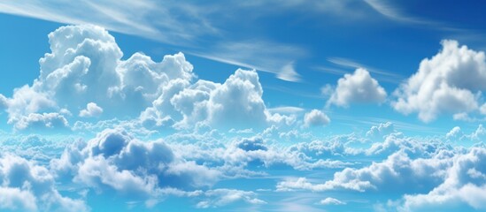 Bright blue sky and fluffy white clouds, natural background