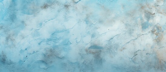 A detailed view of an electric blue and white marble texture resembling cumulus clouds in the sky, reflecting the patterns of a meteorological phenomenon over the dark ocean waters